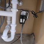 Install quad outlet underneath sink in Naples