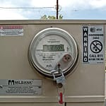 Electrical meter and service connected to grounding